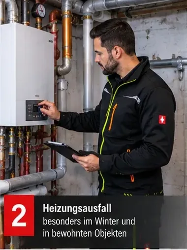 Heizungsausfall, besonders im Winter und in bewohnten Objekten – Mitarbeiter an einer Heizungsanlage
